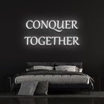 Conquer Together white neon sign, minimalist wall decor for bedrooms and interiors.