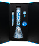 Cookies White V-Beaker Bong complete set in a gift box, including the bong, downstem, bowl, and matching grinder, all featuring the iconic blue logo and design.

