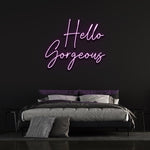 Vibrant Hello Gorgeous LED neon light, a perfect centerpiece for living room decor.