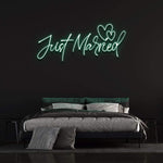 Just Married LED neon sign in green – perfect romantic wedding decor, available in three sizes with custom colors for venues or home keepsakes.