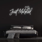 Just Married LED neon sign in white – elegant cursive design for wedding venues, honeymoon suites, or romantic home displays, customizable and lightweight.