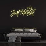 Just Married LED neon sign in yellow – adds a warm and glowing touch to wedding venues, available in custom colors and three sizes.