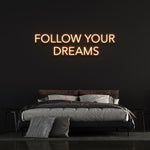 Motivational Follow Your Dreams neon sign with energy-efficient LED light, enhancing home or office ambiance.