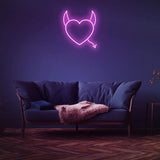 Romantic pink Naughty Love LED Neon Sign, ideal for bedroom or studio decor.