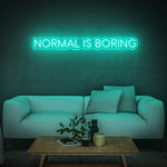 Playful light green 'Normal Is Boring' LED neon sign, an ideal addition to home or office décor that reflects your personality and stands out from the ordinary.