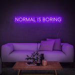 Stylish purple 'Normal Is Boring' LED neon sign, adding a quirky, bold vibe to your home or office décor, and serving as a reminder to embrace your uniqueness.