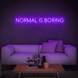 Stylish purple 'Normal Is Boring' LED neon sign, adding a quirky, bold vibe to your home or office décor, and serving as a reminder to embrace your uniqueness.