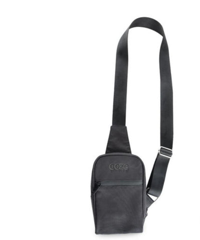 Ooze Traveler Smell-Proof Crossbody Bag with 4 pockets, adjustable slide adjuster, and stylish design in smoke grey and black.