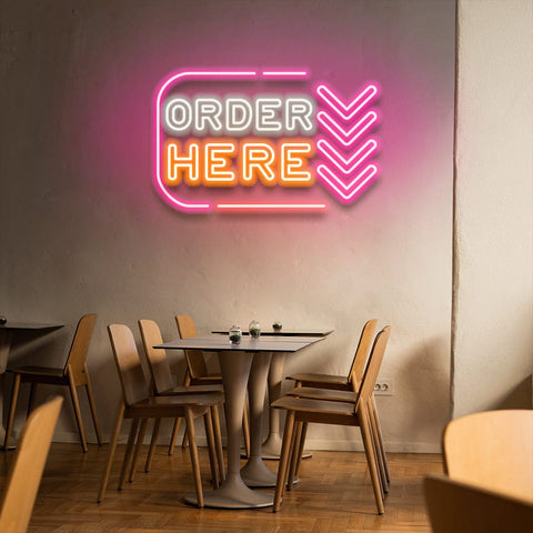 Order Here" LED neon sign for businesses, with bright lettering for clear customer direction, energy-efficient and available in multiple sizes.