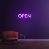 "LED 'Open' neon sign for storefront décor, creating a vibrant and inviting atmosphere for customers.