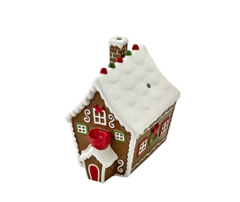 Roast & Toast Gingerbread House Ceramic Pipe – Hand-painted holiday-themed pipe featuring candy canes, gumdrops, and a snowy roof, perfect for 420 enthusiasts and holiday celebrations.






