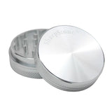 SharpStone® 2-piece grinder featuring neodymium magnets and smooth anodized finish for efficient herb grinding.