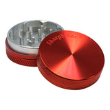 SharpStone® 2-piece metal herb grinder, 2.2-inch size, with protective pouch for safe storage.