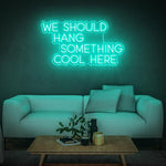 We Should Hang Something Cool Neon Sign – Bright LED Wall Decor for Home or Events, Adds a Fun and Inviting Atmosphere.